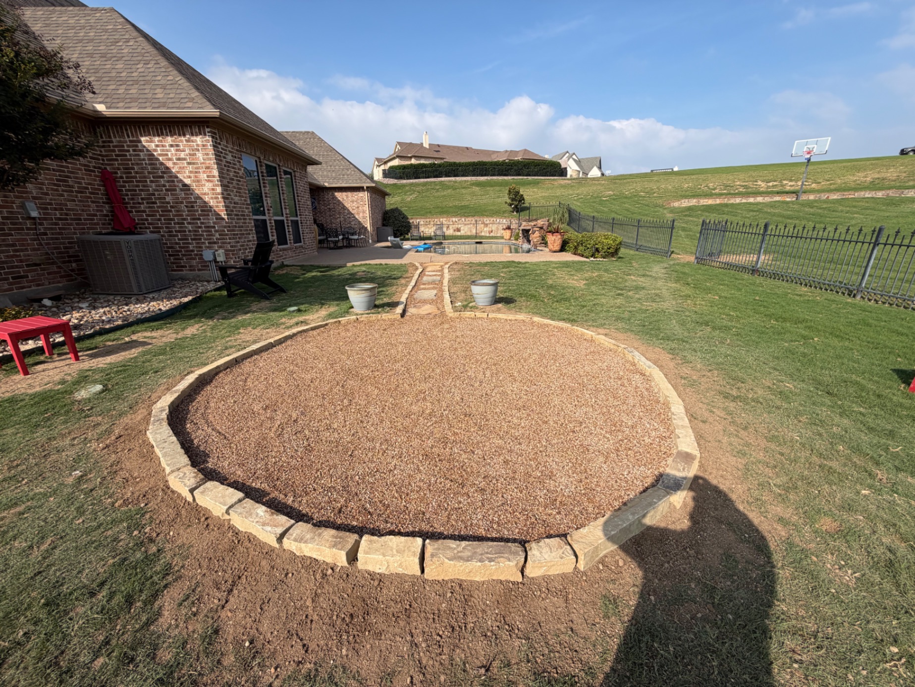 Stone border gravel bed hardscape project