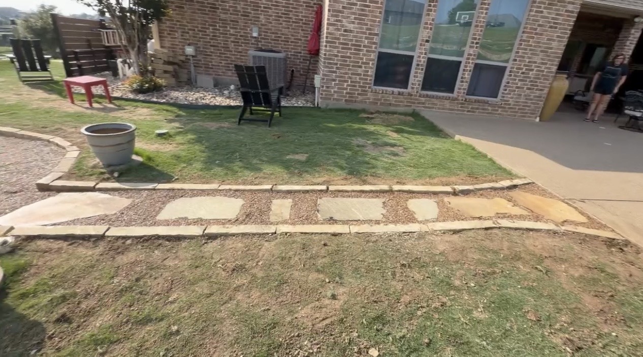Stone walkway and sod installation backyard project
